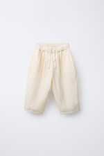 Брюки baggy из рельефной ткани в клетку