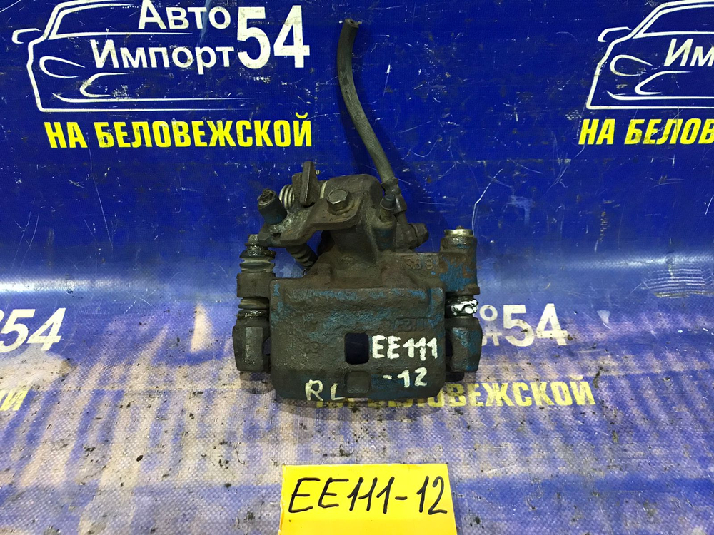 Суппорт тормозной задний левый TOYOTA COROLLA 1999