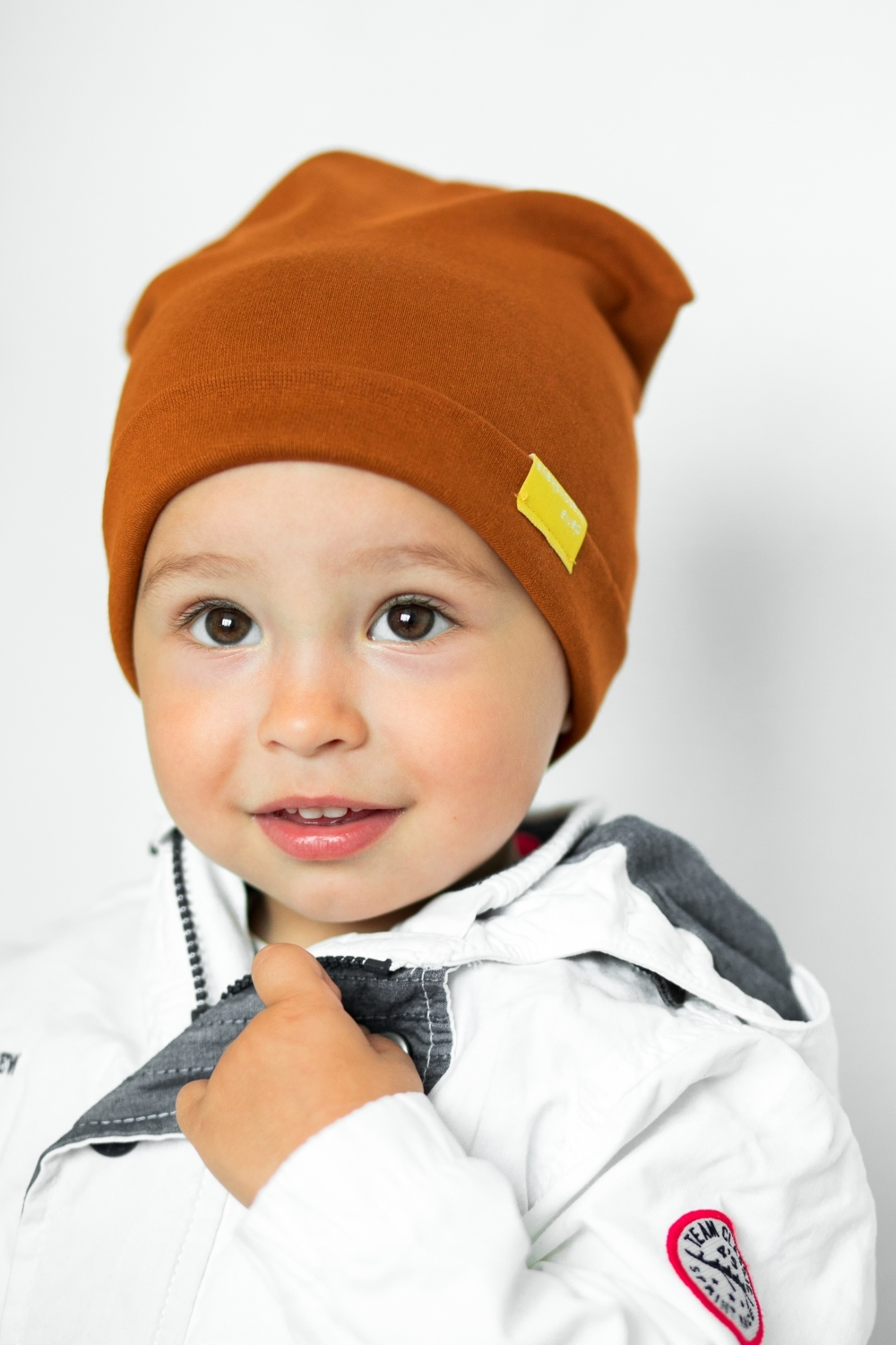 Детская шапка хлопковая гладкая карамельно-коричневая