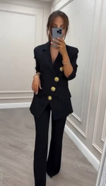 Женский брючный костюм