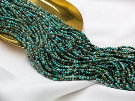 Нить бусин из бирюзы 2,4мм, огранка