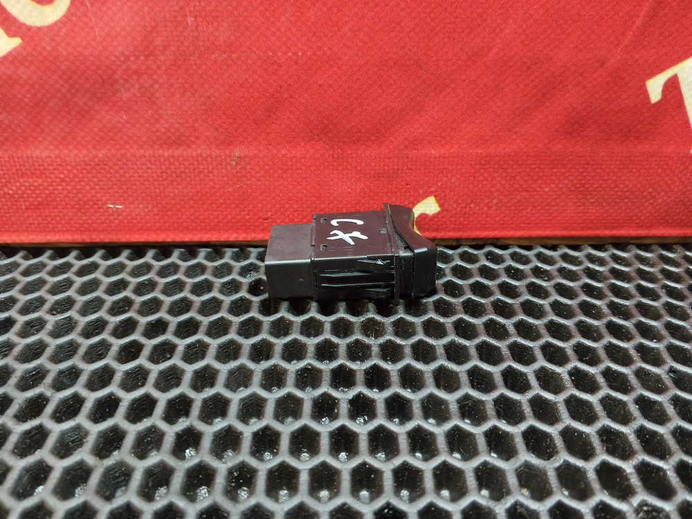 Кнопка системы ASR/ESC