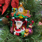 Игрушка Санта у камина