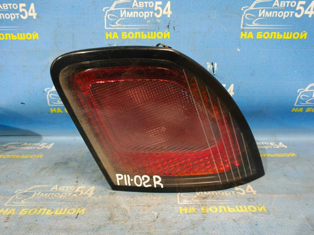 Вставка багажника правая NISSAN PRIMERA 1999