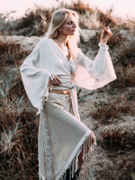 Юбка на кнопках с бахромой бежевая