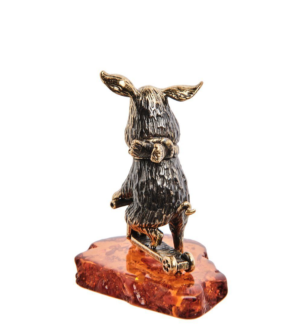 Народные промыслы AM-3042 Фигурка «Поросенок на самокате» (латунь, янтарь)