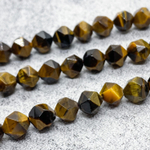 Бусины Тигровый глаз крупной огранки, размер около 8 мм, цена за 12 шт (1/4 нити)
