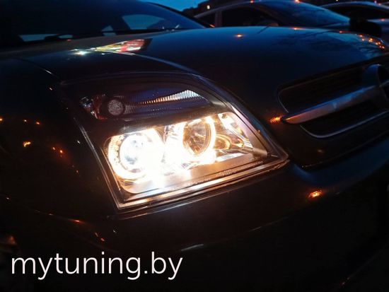 Передние фары Opel Vectra C angel eyes black