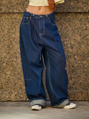 Темно-синие джинсы-трансформеры на кулиске