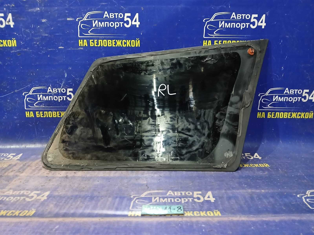 Стекло багажника левое NISSAN AD 2001