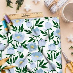 Ткань оксфорд 600 бледные голубые цветы с тёмно-зелёными листьями