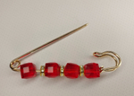 Булавка брошь "Красные камешки" для кардигана, пальто, платков, костюмов, шарфа, одежды .Цвет ярко красный.