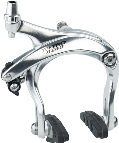 Тормоз клещевой задний TEKTRO, серебристый, на гибрид, кованые алюм рычаги 55-73мм. Инд уп