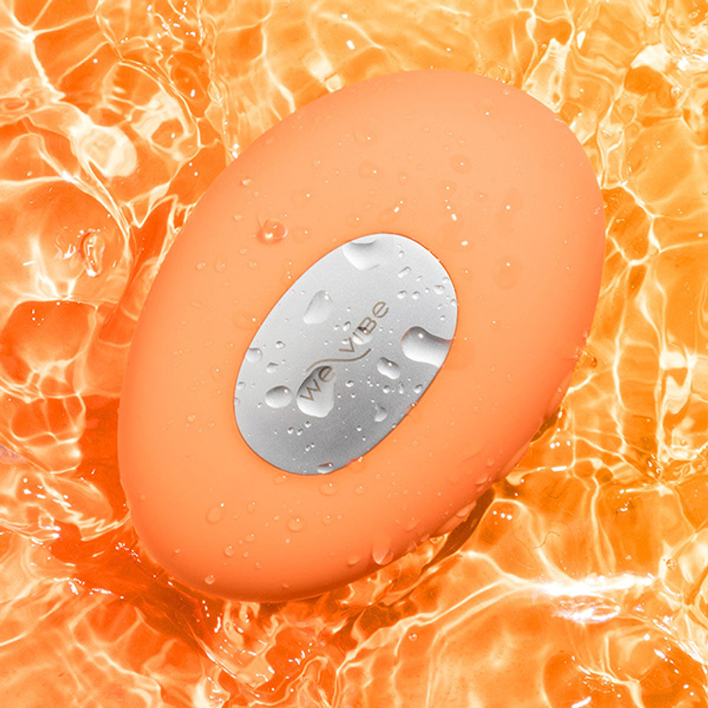 Оранжевый клиторальный вибратор 9,6см We-Vibe Temp Heating & Cooling Massager Tangerine SNHS1SGA