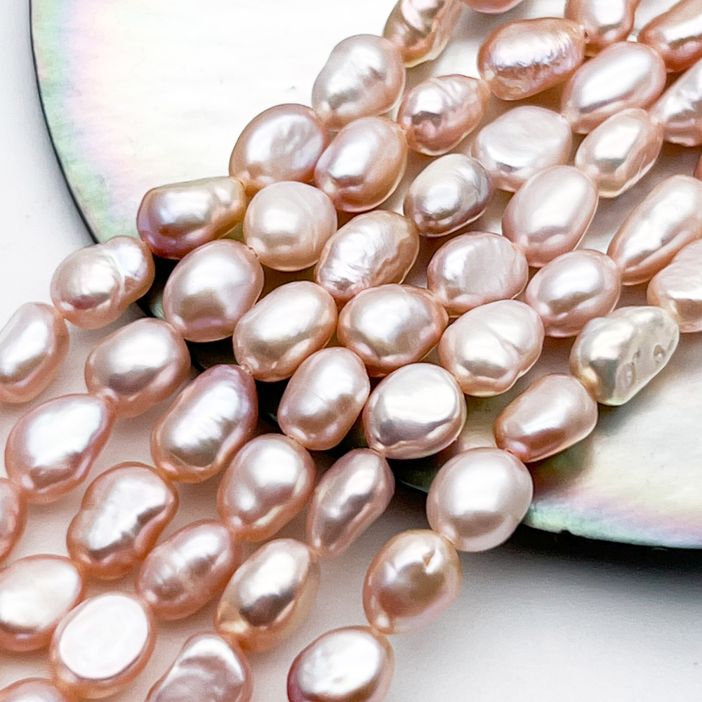 Жемчуг фриформ бусины, цвет розовый, размер около 7-8*5,5-6 мм, цена за отрезок 17 см (1/2 нити)