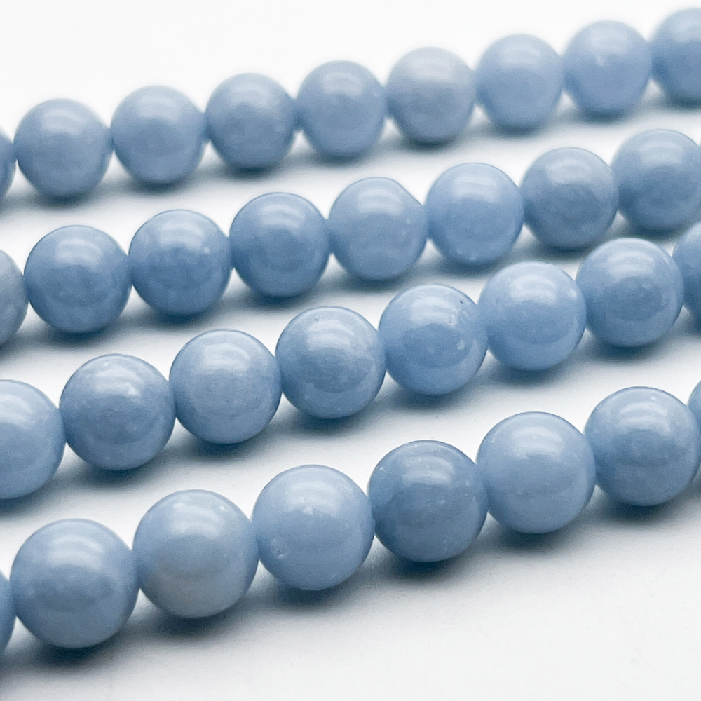 Ангелит бусины, диаметр 8,3-8,6 мм, цена за 11 шт (1/4 нити)