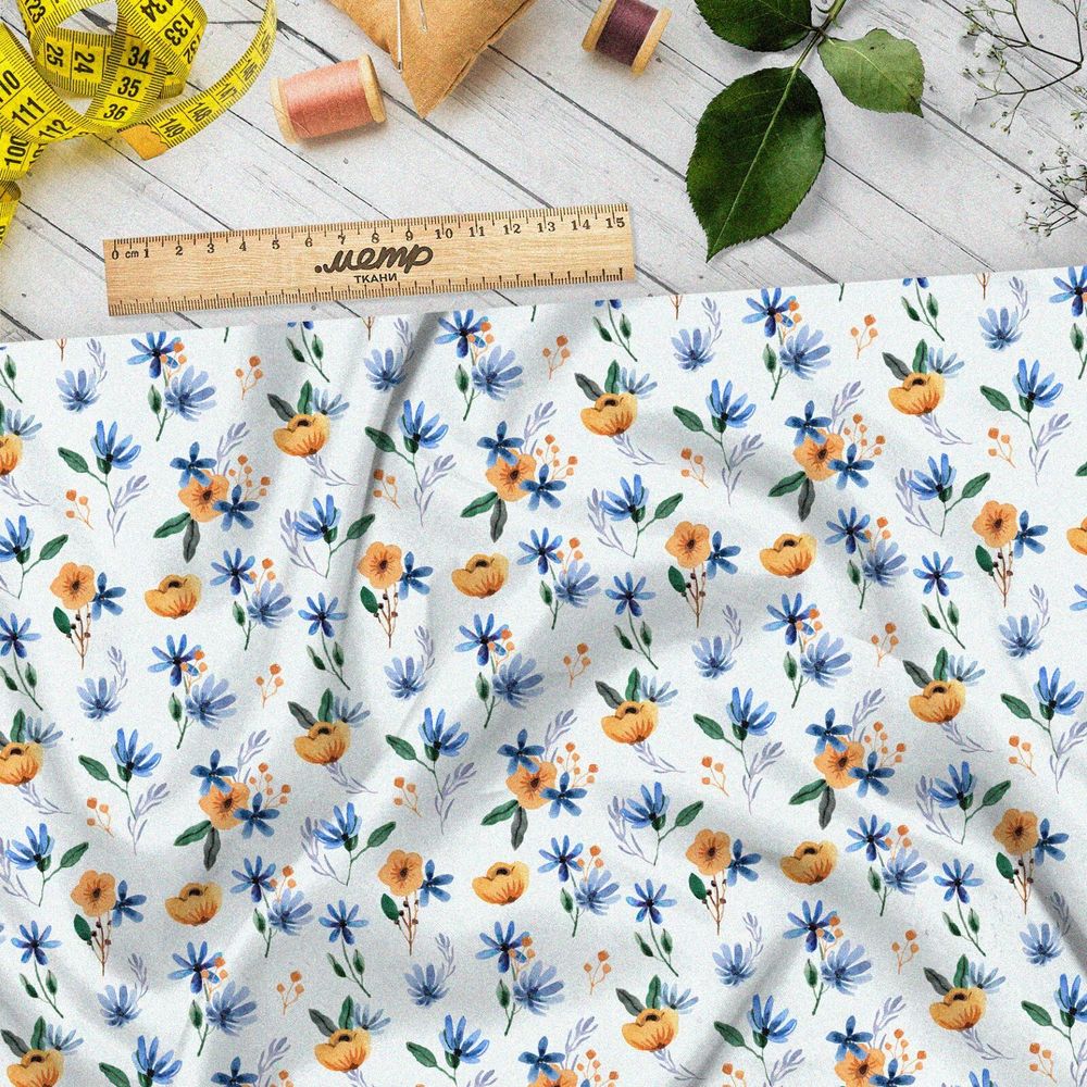 Ткань штапель оранжевые цветочки с голубыми листочками