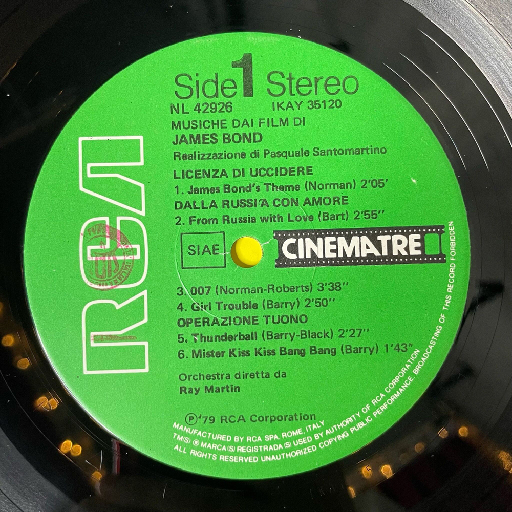Винтажная виниловая пластинка LP Orchestra Diretta Di Ray Martin Musiche Dai Film Di James Bond 007 (Italy 1979)