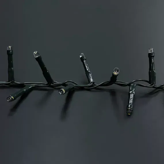 Светодиодная нить Snake Light 700 теплых белых ламп, 14 м., 24В, 8 режимов, зеленый провод, для елки 215 см., Christmas DeLuxe (83782)