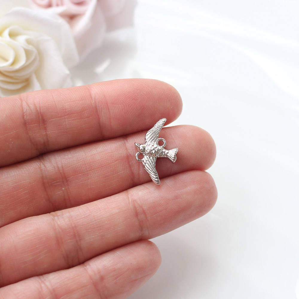 п576-р Коннектор "Птичка" 20*13мм, родий