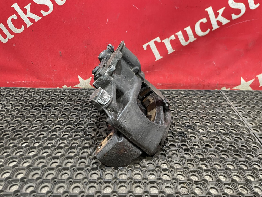 Суппорт передний левый