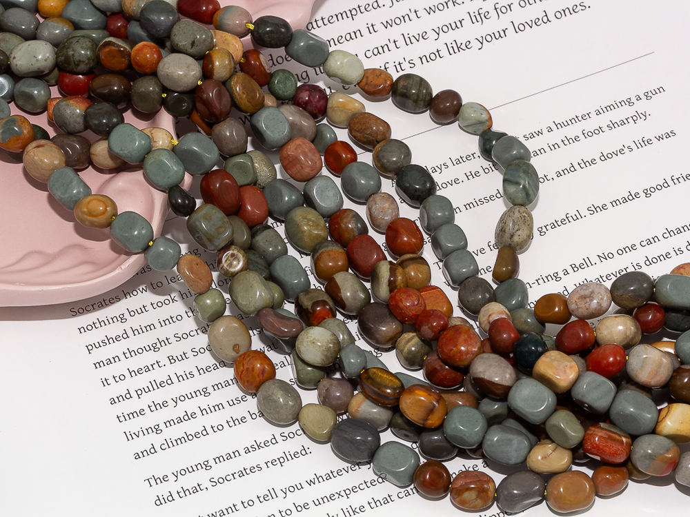 Нить бусин из яшмы 7х9мм, галтовка