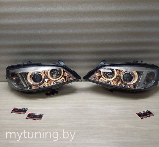 Передние фары Opel Astra G angel eyes chrome