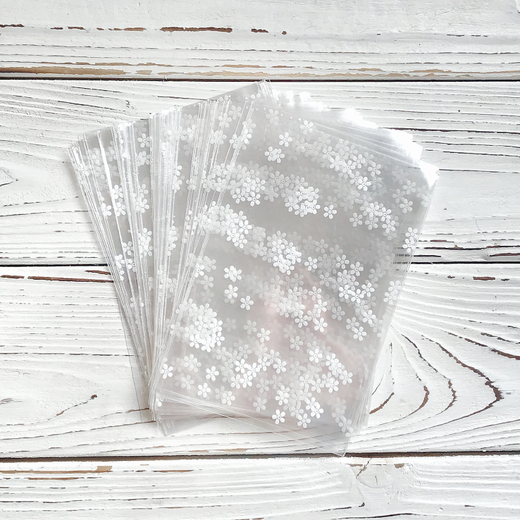 Прозрачный пакет 10х15 см (белые цветы), 100 шт