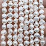 Жемчуг 2А речной бусины 7-8 мм, на нитке 38 см