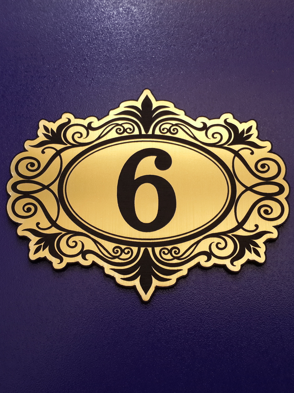 золотой номерок