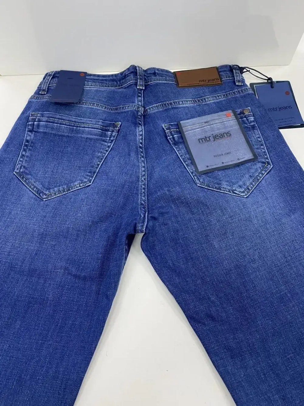 Джинсы мужские