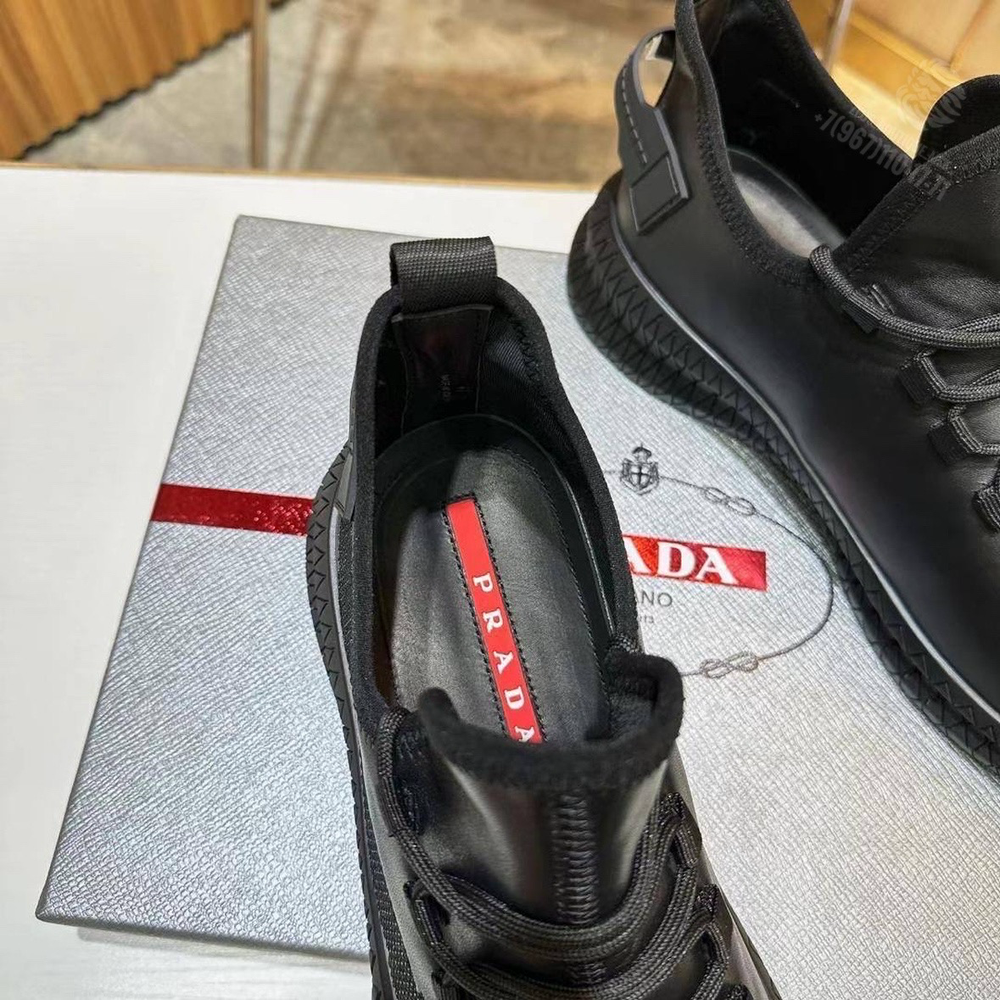Кроссовки Prada