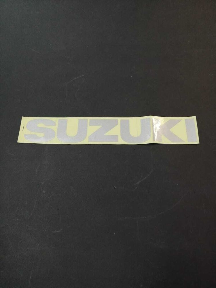 Наклейка Suzuki 32х5 сер 1шт/уп