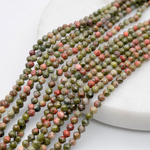 Унакит граненый, диаметр около 3,2 мм, цена за нить 38 см