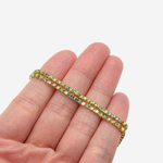 Стразовая цепь дуохромная, 2мм, голубой кристалл с зеленым напылением в позолоченных цапах