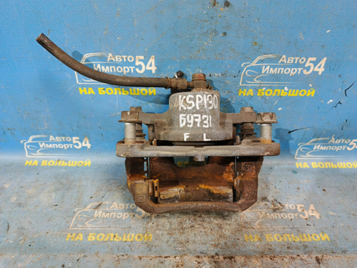 Суппорт тормозной передний левый TOYOTA VITZ 2010-2014