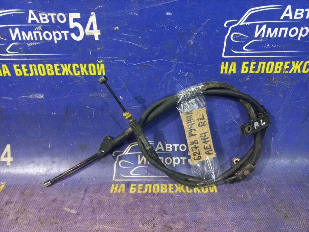 Трос ручника левый TOYOTA CARIB 1995-2002