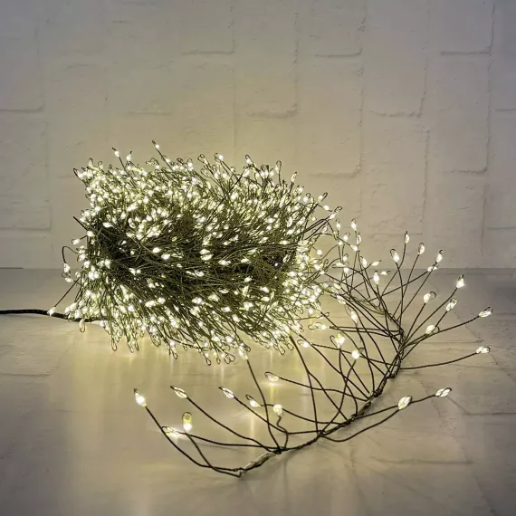 Светодиодная нить кластер 960 теплых белых ламп, 6 м., 8 режимов, зеленый провод, Christmas DeLuxe (87448)