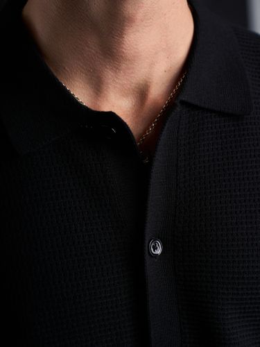 Черная трикотажная рубашка Laine с коротким рукавом