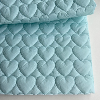 Курточная стеганая ткань Голубые сердечки