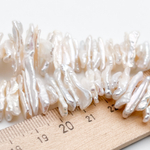 Жемчуг, размер около 16-23 мм, цена за отрезок 9 см (1/4 нити)