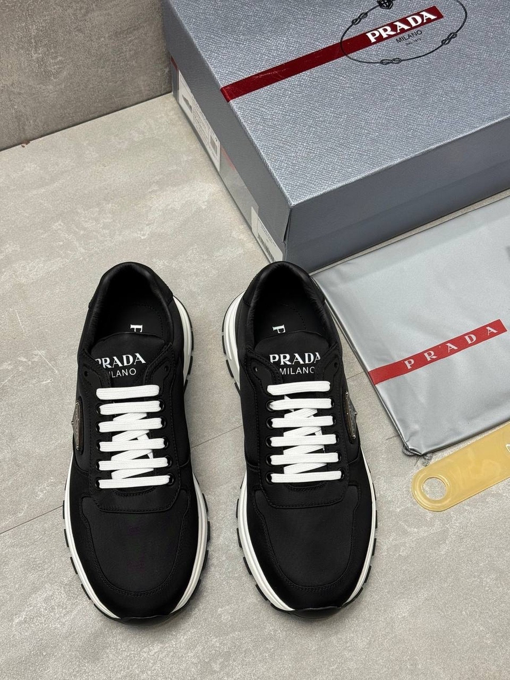 Кроссовки Prada