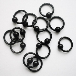 Кольцо сегментное 1,2 мм черное диаметр 8 мм (шарик 4 мм) для пирсинга. Медицинская сталь, титановое покрытие. 1 шт