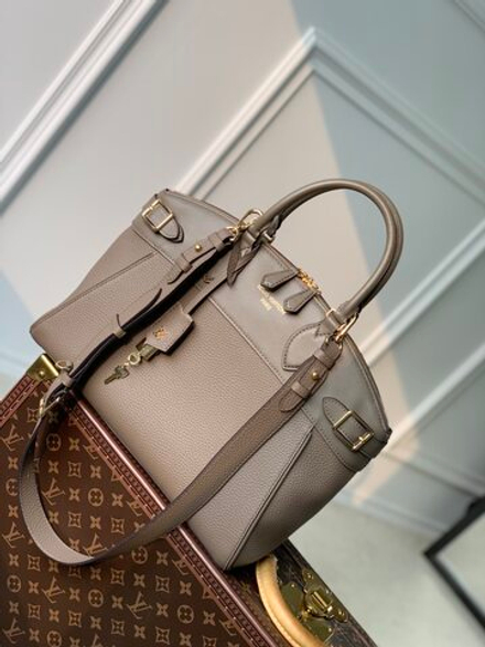 Louis Vuitton Lock It MM Bag