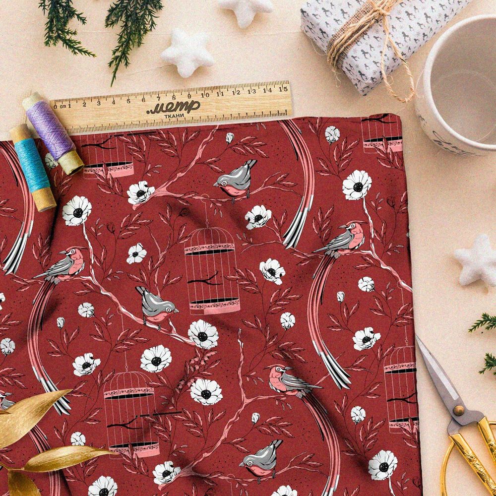 Ткань габардин мелкие снегири, цветы и птичьи клетки на бордовом фоне