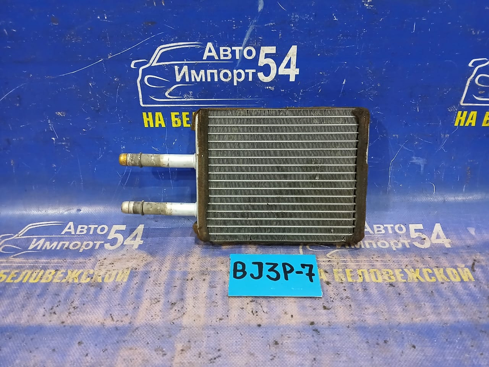 Радиатор печки MAZDA FAMILIA 2001