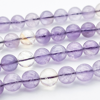 Аметист с кварцем бусины ("Аметрин"), диаметр около 8,1-8,3 мм, цена за 12 шт (1/4 нити)