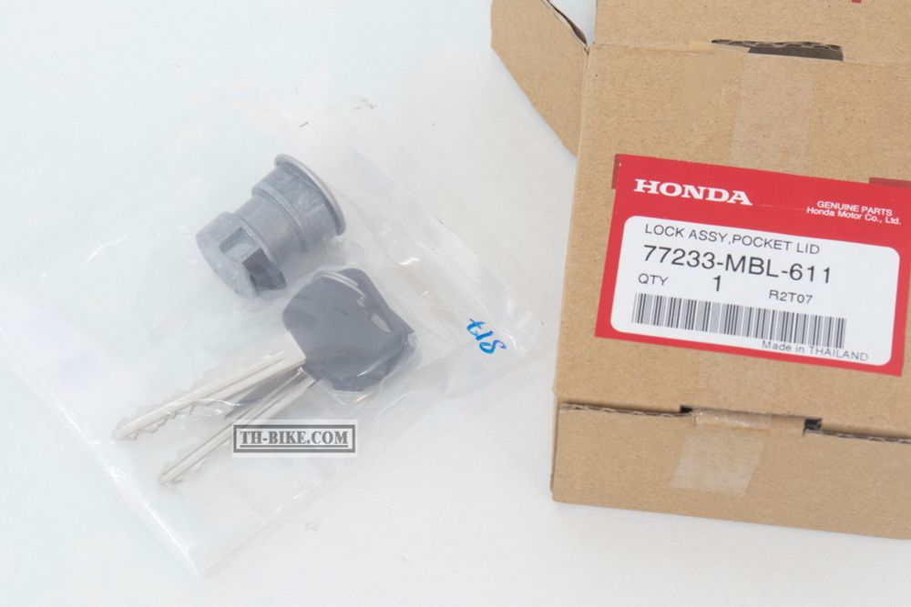 77233-MBL-611. LOCK ASSY., POCKET LID