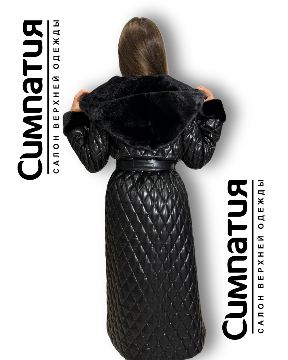 Стильное пальто в черном цвете с декоративными рукавами