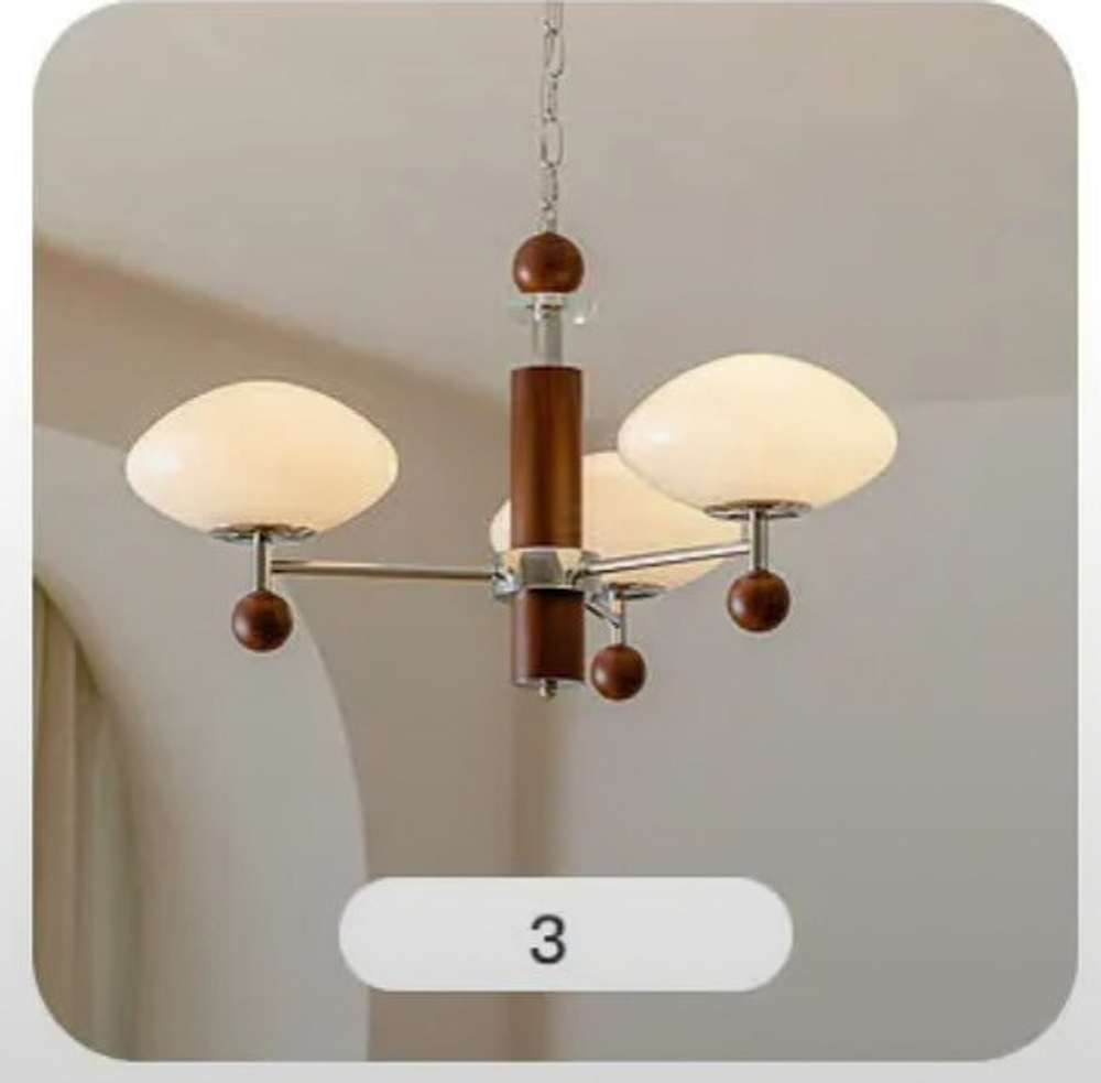 Этот светильник — стильная комбинация дерева, металла и матового стекла.